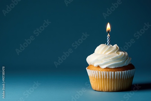 Delicious Cupcake with Single Candle Against Blue Background, Perfect for Celebrations and Birthdays