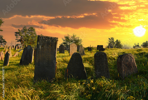 Cemetery with graves and tombstones. photo