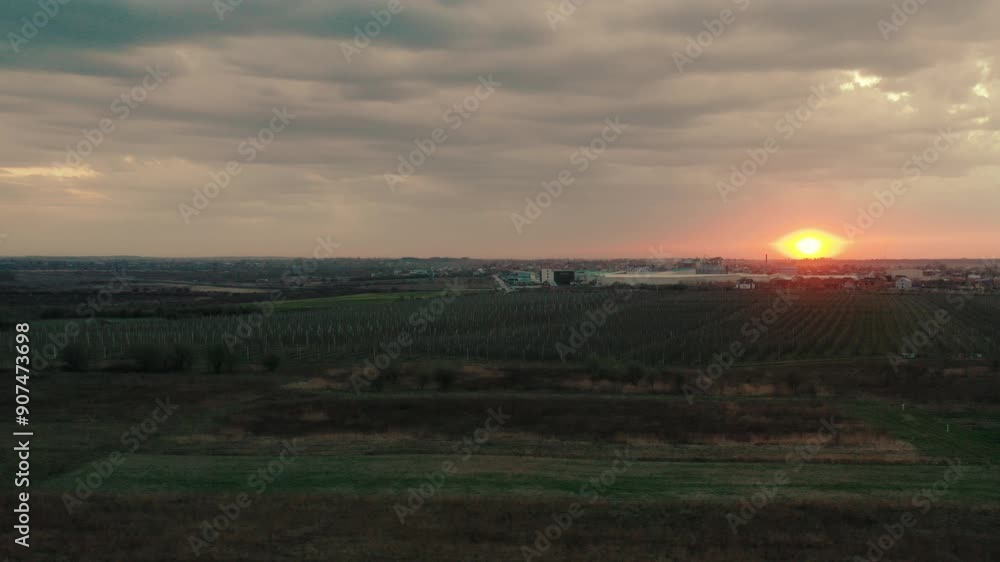 Beautiful sunset on the outskirts of the city from a drone. Sunset from a bird's eye view. Beautiful sunset on the outskirts of the city from a drone. Sunset from a bird's eye view.