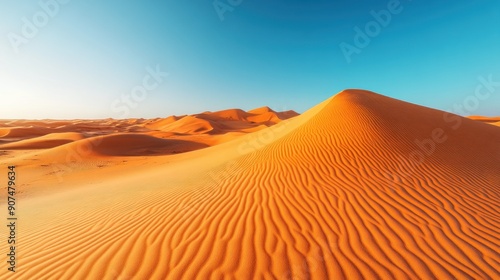 Rippling Sand Dunes Under a Clear Blue Sky