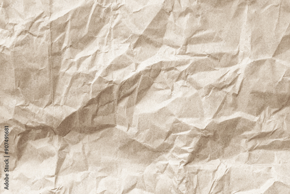 Fototapeta premium Crumpled brown paper texture. Abstract background and texture for design.