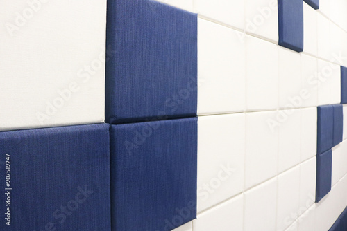 Blue and white fabric acoustic wall background.