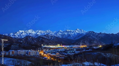 The Magnificent Snow-Capped Mountains Against the Blue Sky Background at Night in Rizhao Jinshan. A Stunning Natural Sight that Evokes Peace and Awe. The Beauty of Nature in Its Pristine Form. photo