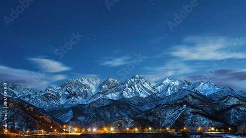 The Magnificent Snow-Capped Mountains Against the Blue Sky Background at Night in Rizhao Jinshan. A Stunning Natural Sight that Evokes Peace and Awe. The Beauty of Nature in Its Pristine Form. photo