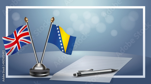 United Kingdom and Bosnia and Herzegovina Small national flag on bokeh background, cooperative relationship