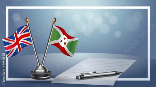 United Kingdom and Burundi Small national flag on bokeh background, cooperative relationship