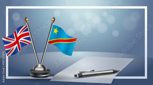 United Kingdom and Congo Small national flag on bokeh background, cooperative relationship