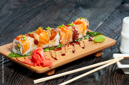 Philadelphia sushi set with salmon on a wooden board