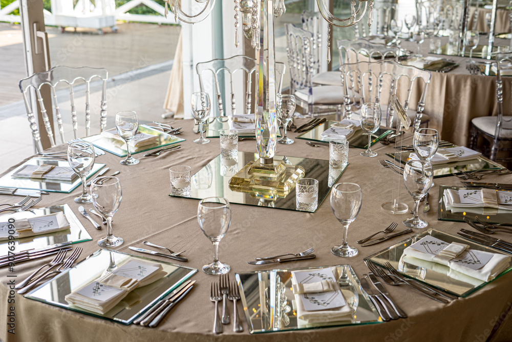 Indoor Wedding Reception: Round Tables with Unique Floral Centerpieces