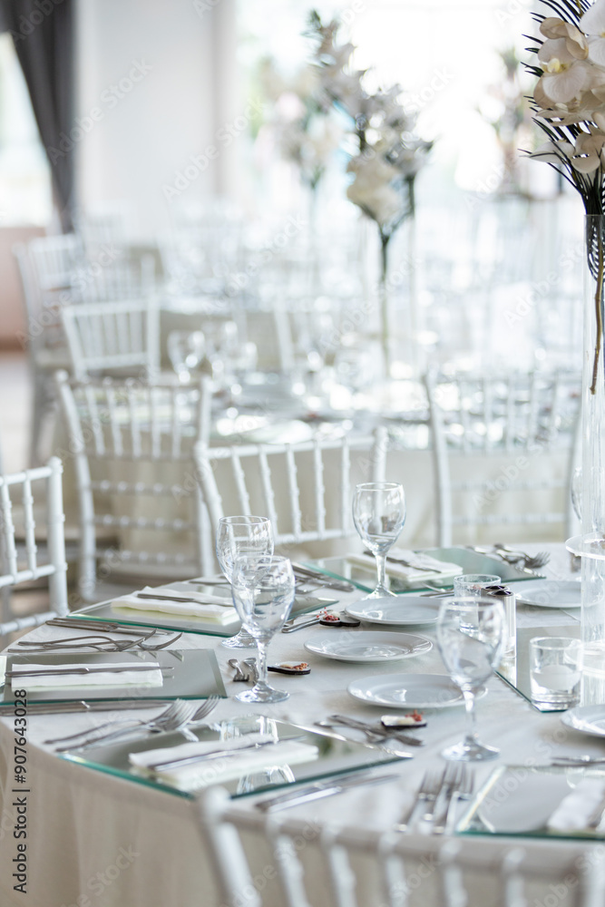Indoor Wedding Reception: Round Tables with Unique Floral Centerpieces