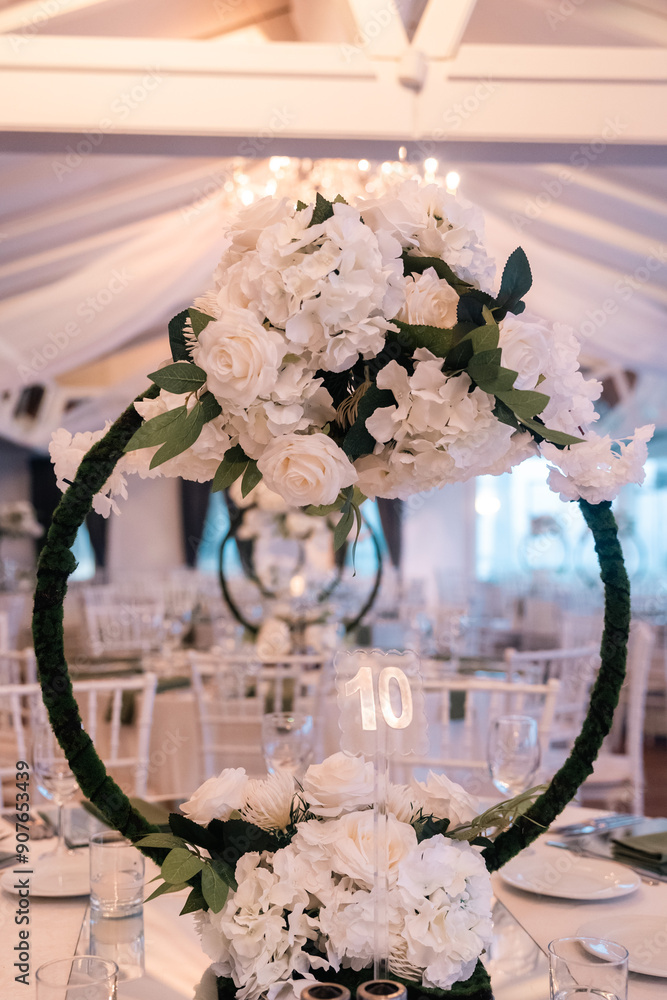 Elegant Wedding Table Setting with Floral Hoops and White Flowers