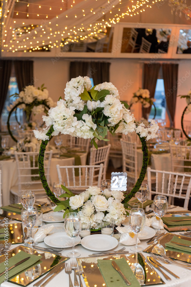 Elegant Wedding Table Setting with Floral Hoops and White Flowers