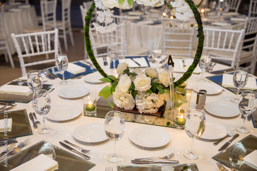 Elegant Wedding Table Setting with Floral Hoops and White Flowers