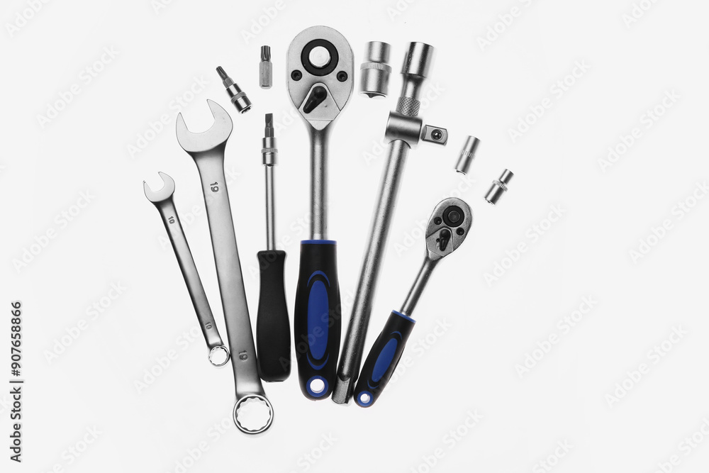 Set of auto mechanic's tools on white background, flat lay Set of auto mechanic's tools on white background, flat lay