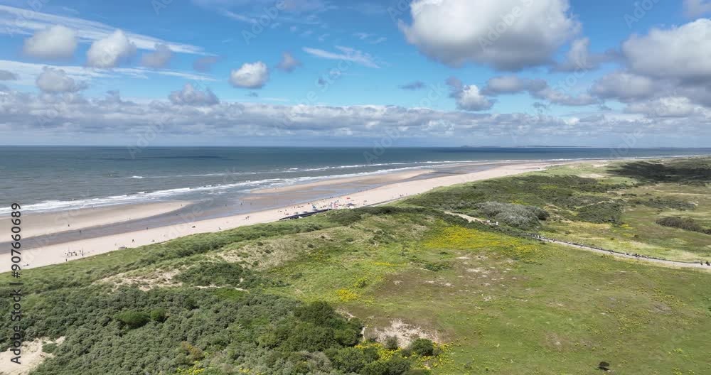 Dunes bordering the dutch north Sea in The Netherlands. Zeeland nature landscape, aerial drone video Dunes bordering the dutch north Sea in The Netherlands. Zeeland nature landscape, aerial drone video