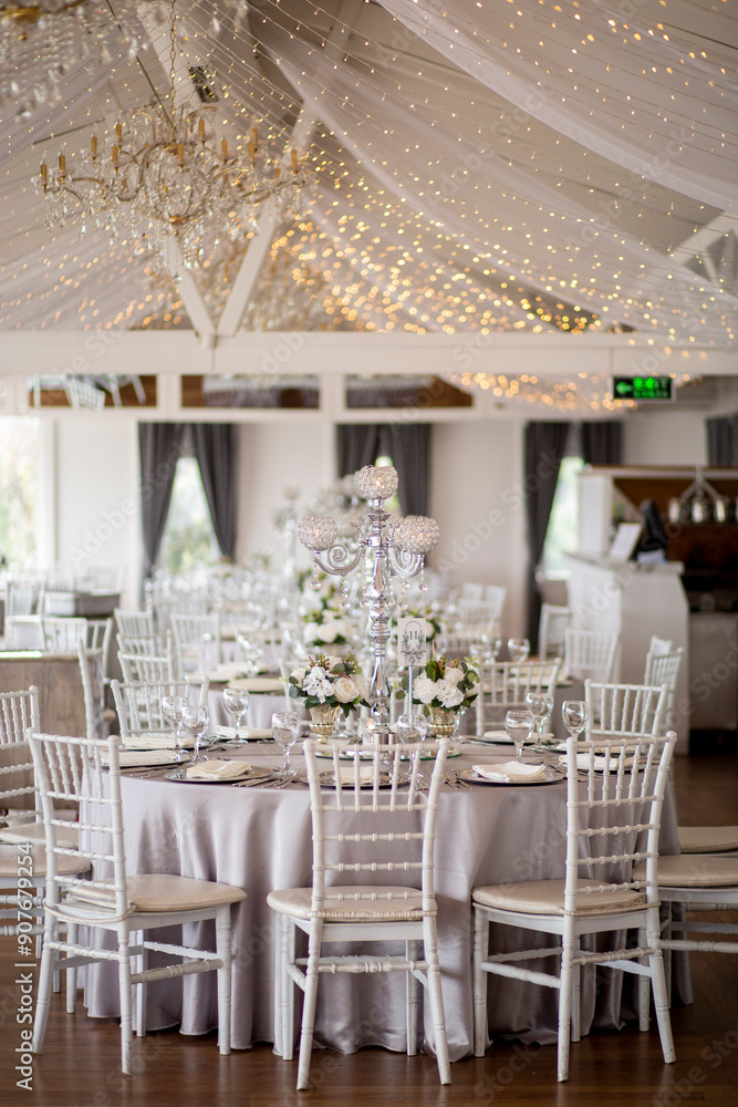 Elegant Indoor Wedding Reception with Blue Hydrangeas and White Roses Centerpiece