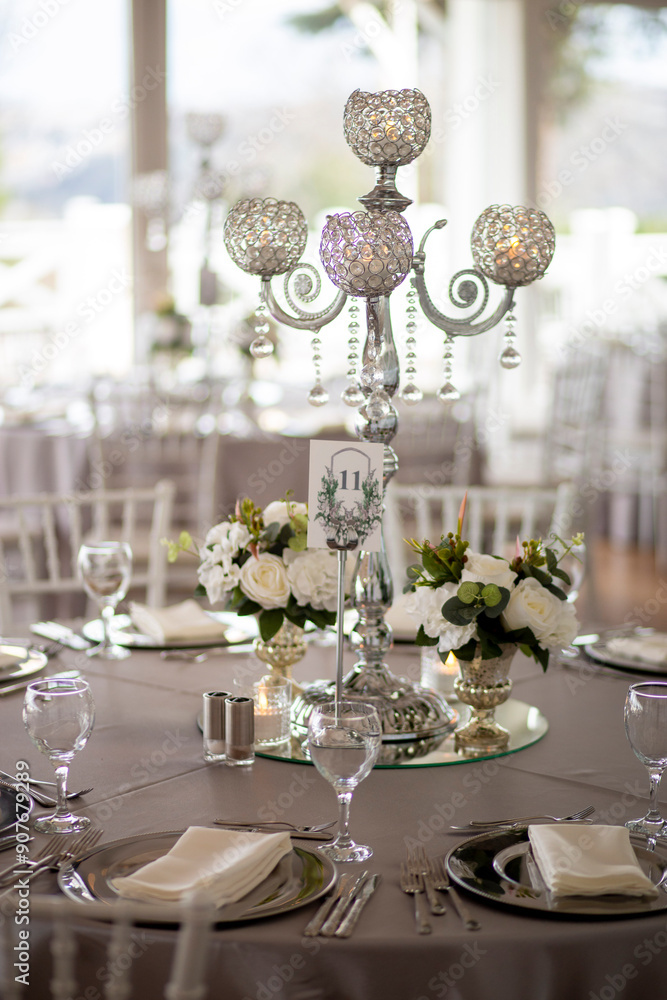Elegant Indoor Wedding Reception with Blue Hydrangeas and White Roses Centerpiece