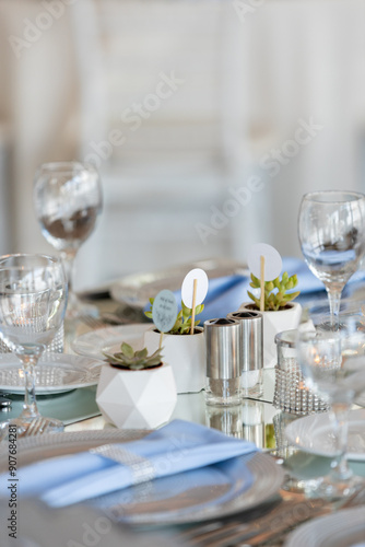 Obraz na płótnie Beautiful Wedding Venue in Istanbul: Tables with Floral Centerpieces and Bridge View w salonie