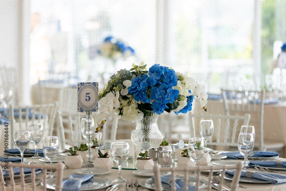 Beautiful Wedding Venue in Istanbul: Tables with Floral Centerpieces and Bridge View