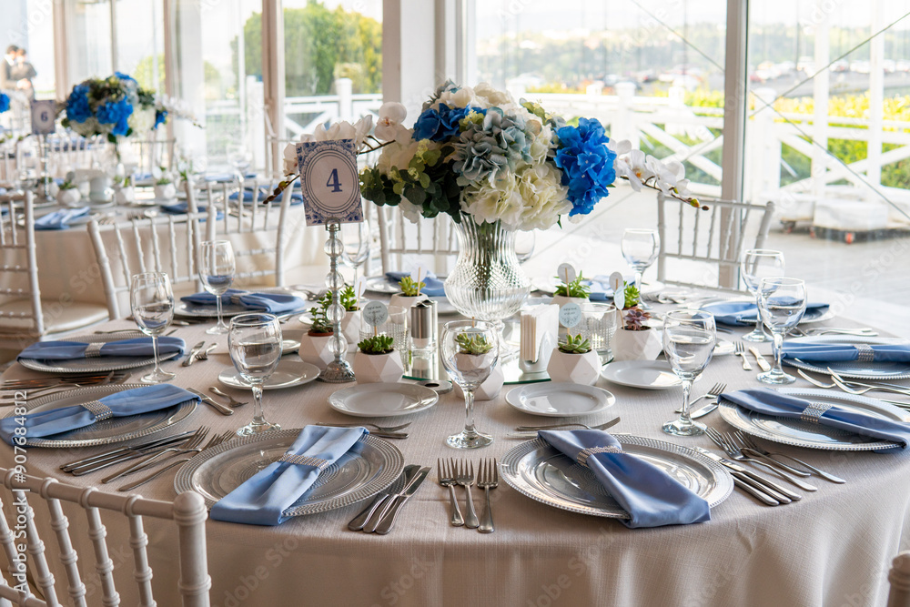 Beautiful Wedding Venue in Istanbul: Tables with Floral Centerpieces and Bridge View