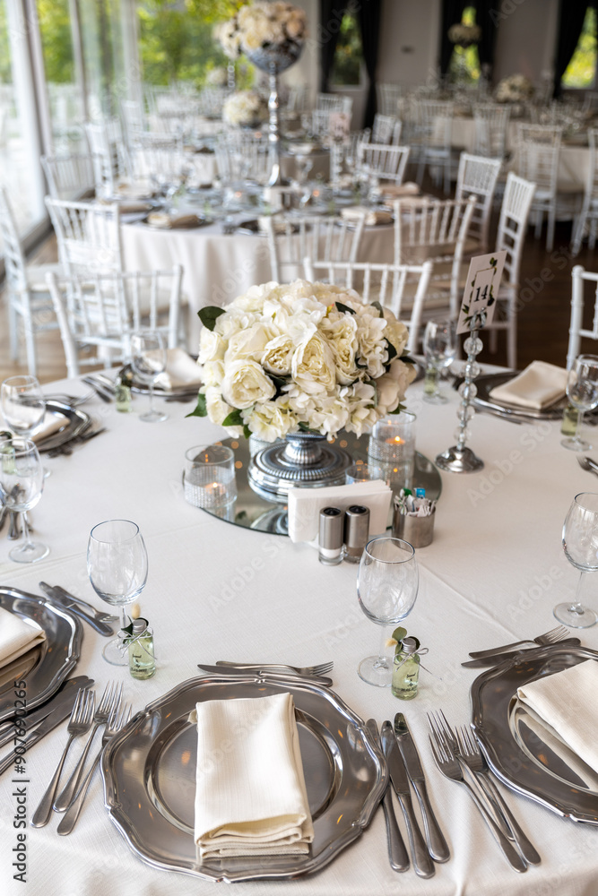 Stylish Outdoor Reception: Lounge Furniture with Floral Accents and Urban Panorama