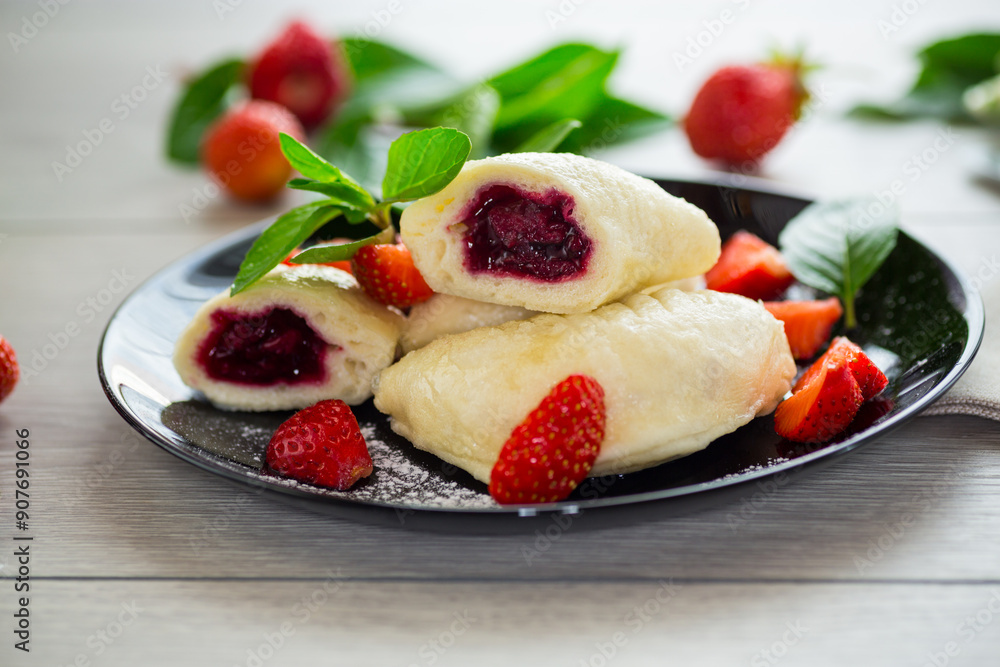 cooked sweet homemade steamed dumplings with strawberries cooked sweet homemade steamed dumplings with strawberries