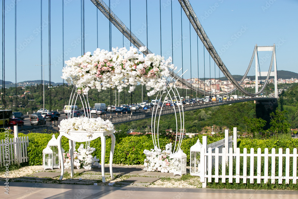 Elegant Wedding Decor with White Flowers and Bosphorus Bridge View