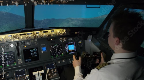 Captain guides aircraft with steering wheel turning thrust lever. Pilot navigates airplane gaining altitude above mountains
