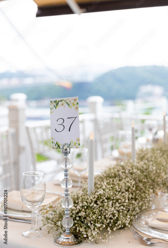 Beautifully Decorated Wedding Table with Natural Greenery Centerpiece