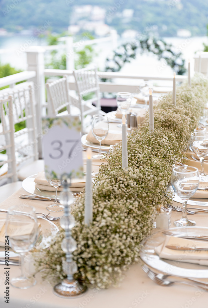 Beautifully Decorated Wedding Table with Natural Greenery Centerpiece