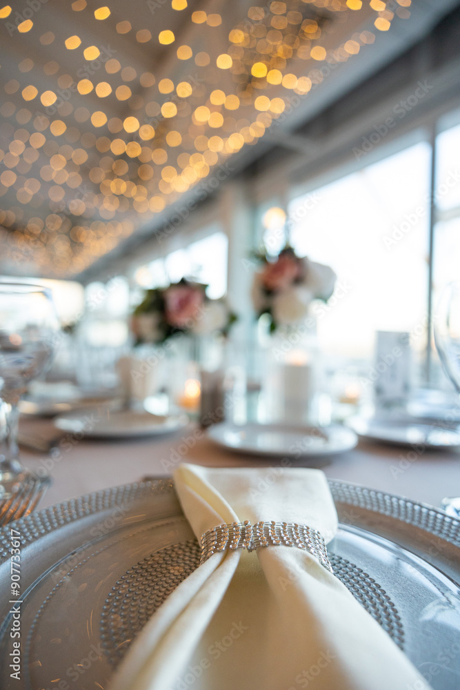 Elegant Wedding Table with Pastel Flowers and Greenery at Indoor Reception