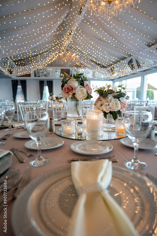 Elegant Wedding Table with Pastel Flowers and Greenery at Indoor Reception