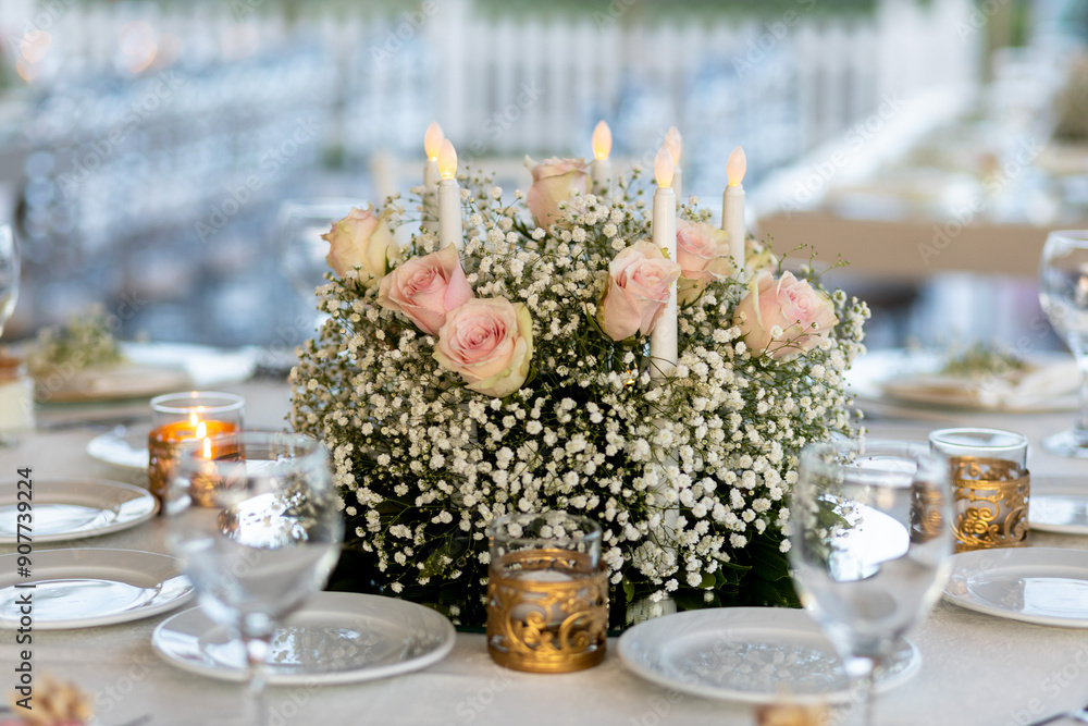 Refined Wedding Reception Table with White Flowers, Pink Roses, and Soft Light
