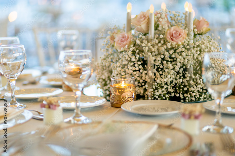 Elegant Wedding Table Centerpiece with Baby's Breath, Roses, and Candles