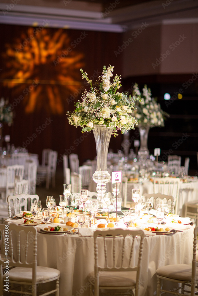 Luxury Wedding Venue: Beautifully Decorated Table with Crystal Candelabras and White Candles