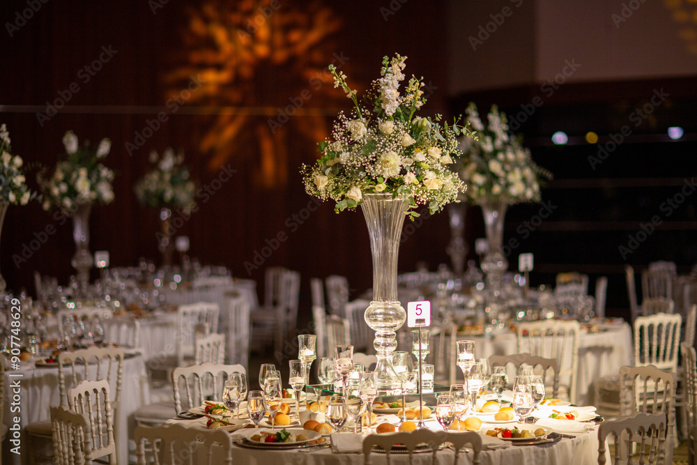 Luxury Wedding Venue: Beautifully Decorated Table with Crystal Candelabras and White Candles