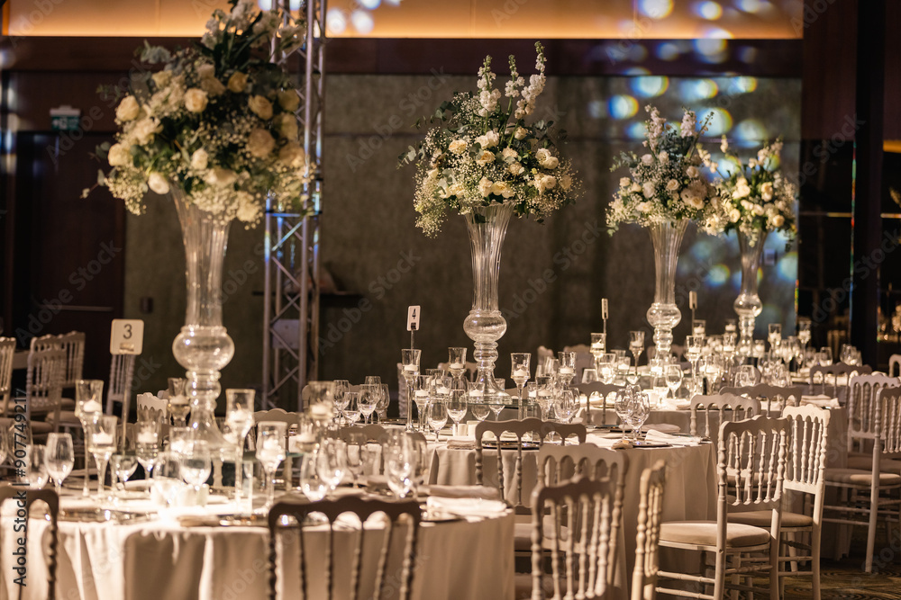 Luxury Wedding Venue: Beautifully Decorated Table with Crystal Candelabras and White Candles