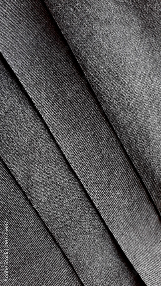 Fototapeta premium Black linen jersey. Matte black knit fabric. Texture of knitted fabric. Textile background.
