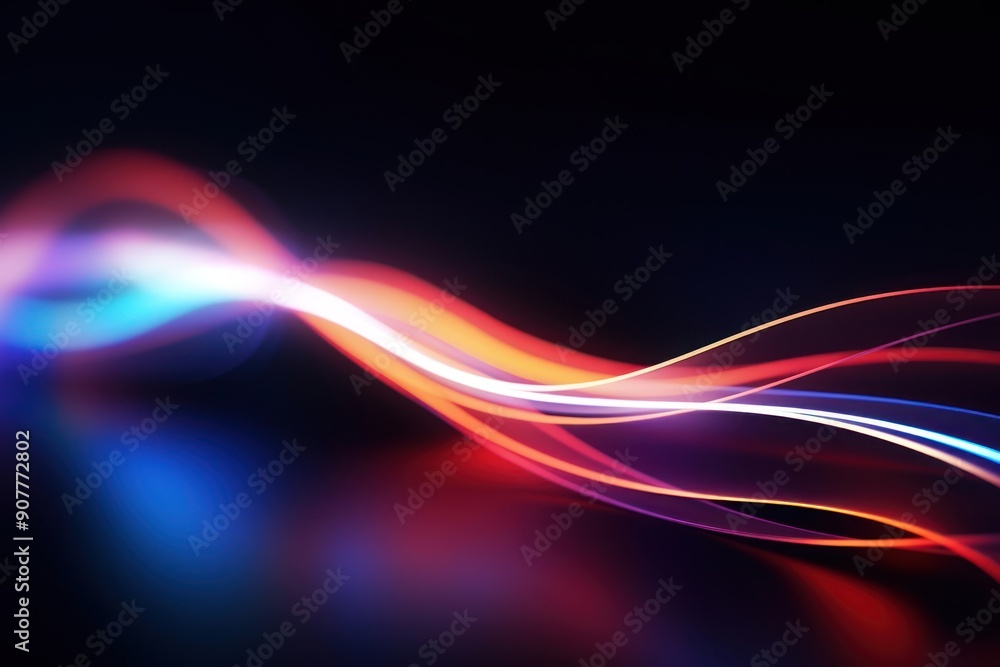 Colorful light trails on dark background backgrounds futuristic technology. Colorful light trails on dark background backgrounds futuristic technology.