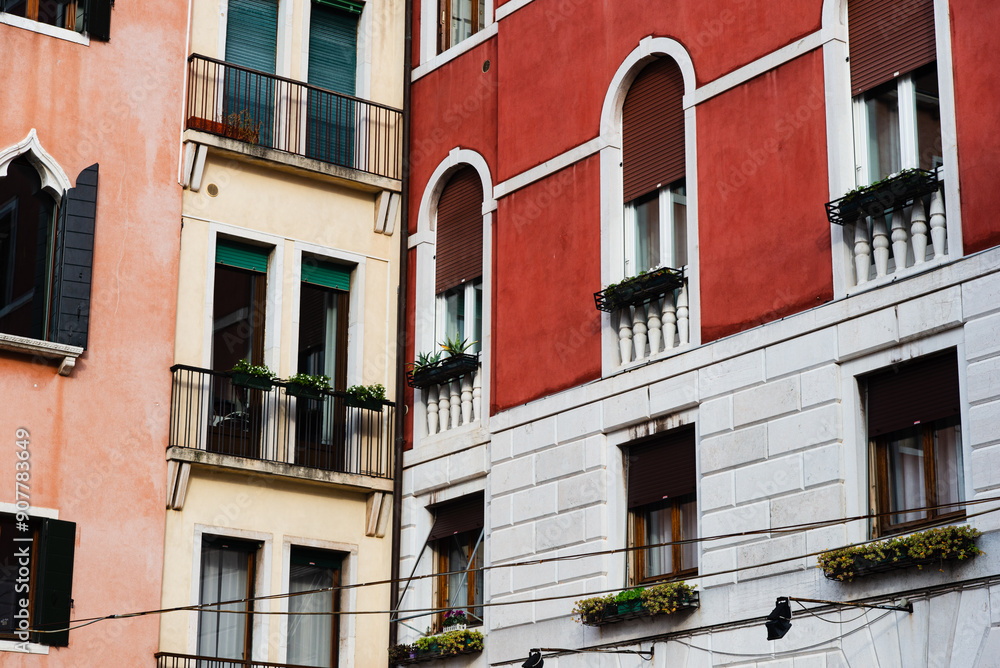 Fototapeta premium Venice, Italy-April 24, 2024: Colorful Venetian Building Facades
