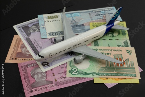 Airplane Model and Bangladeshi Taka Currency photo