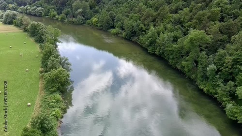 Aerial view of Kolpa River (Gorenjci pri Adlešičih) in Slovenia (J) Specs: 4K-30fps | 45Mbps Keywords: #4K, #QHD, #drone, #background, #river, #trees, #forest, #grassfield - DATE: June 23th, 2024 photo