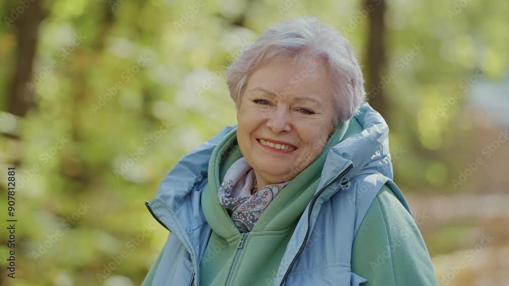 Old Woman Enjoys a Peaceful Autumn Walk in the Park Old Woman Enjoys a Peaceful Autumn Walk in the Park