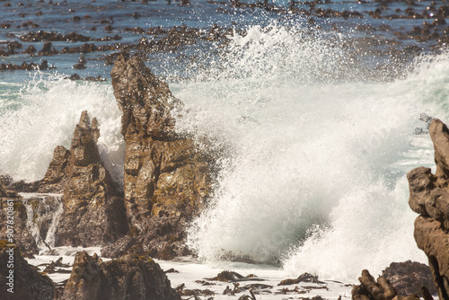 Waves breaking on a rock at Stony Point in Betty's Bay, Western Cape of South Africa