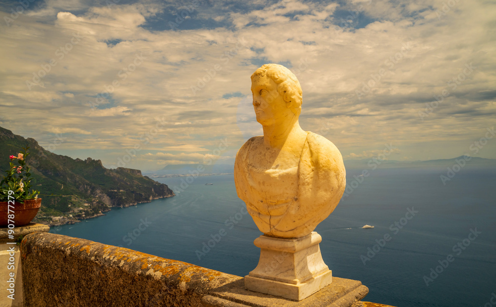 Marble Statue Overlooking Stunning Coastal Landscape on a Cloudy Day, cimbrone villa in Ravello, Italy