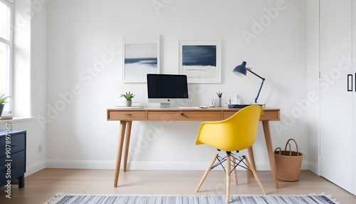 A modern home office includes a wooden desk and office chair positioned against a white wall This Scandinavian interior design of the modern living room provides a comfortable workplace
