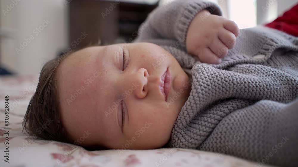 Baby peacefully sleeping on a bed, wearing a knitted sweater, depicting a calm and cozy moment of rest in a warm and nurturing home environment, emphasizing tranquility Baby peacefully sleeping on a bed, wearing a knitted sweater, depicting a calm and cozy moment of rest in a warm and nurturing home environment, emphasizing tranquility