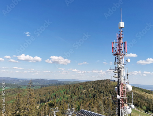 Telecommunications masts. Radio station in the forest	
