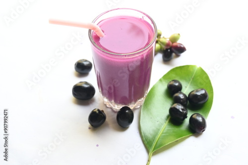 Syzygium cumini fruits juice. Its other names Malabar plum, Java plum, black plum, jamun and  jambolan. This fruit have anti diabetic properties. Indian jamun juice. Healthy drink. Fruit juice. photo