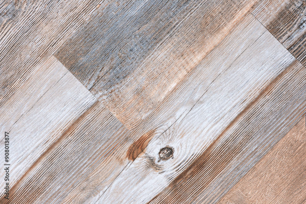 Fototapeta premium A wooden plank with a grainy texture. The wood is light brown in color. The grain of the wood is visible, and it is a natural wood